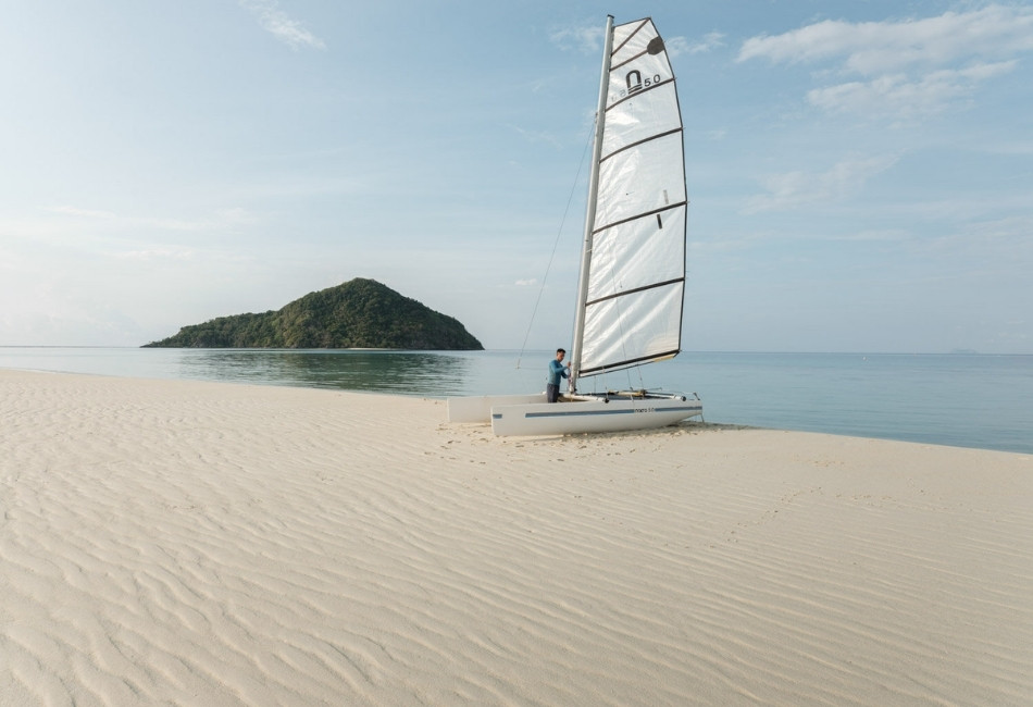 Beach sailing activity on a family island tour in Indonesia