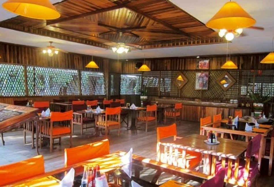 Wooden lodge restaurant for a luxury safari tour in Indonesia