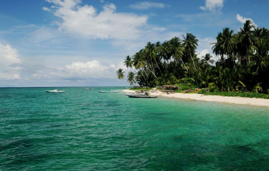 Aerial view of Derawan Island with turquoise waters and beachfront villas at Arasatu Villas & Sanctuary, Berau, East Kalimantan