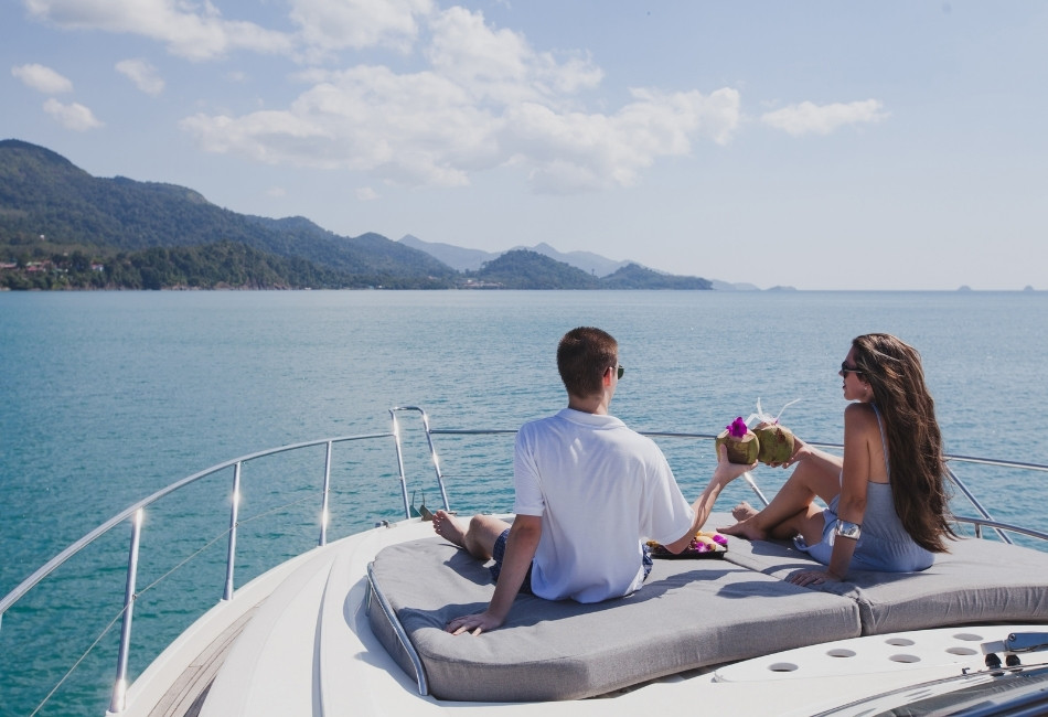 couple enjoying honeymoon onboard of luxury boat, luxurious yacht in komodo