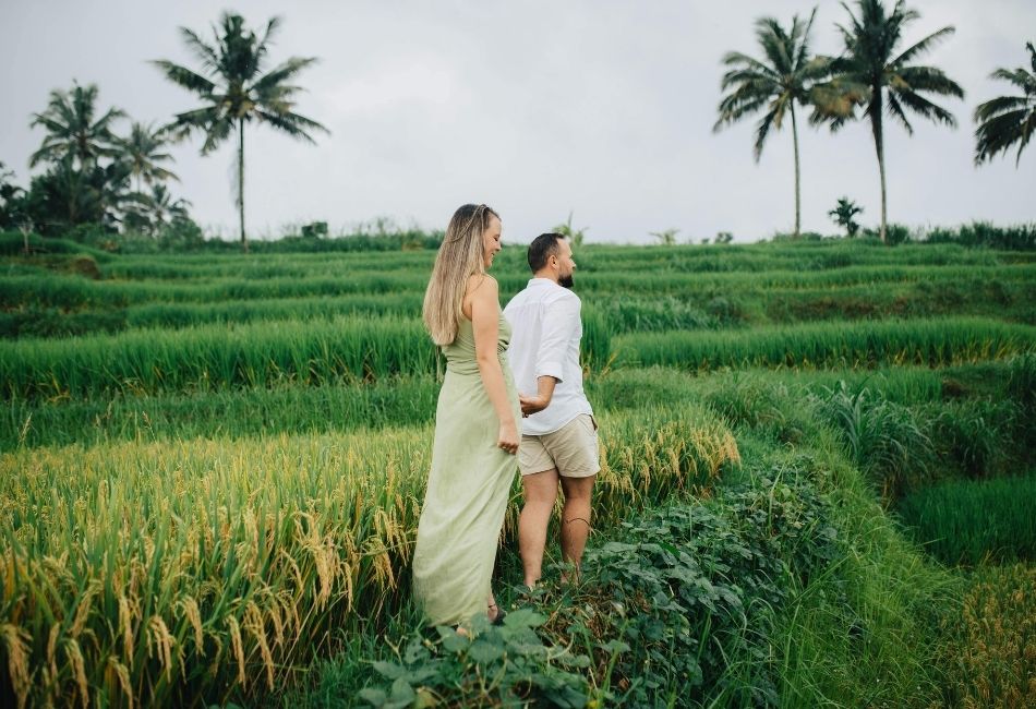 Couple Exploring Scenic Rice Terraces in Bali